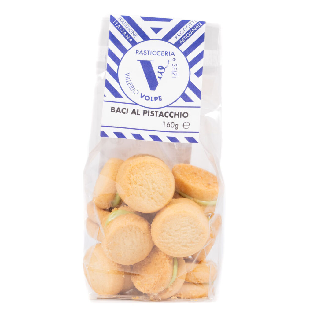 Baci di Dama with Sicilian almond produced in the territory of Avola and Vercellese Rice Flour with white chocolate flavored with orange and cinnamon